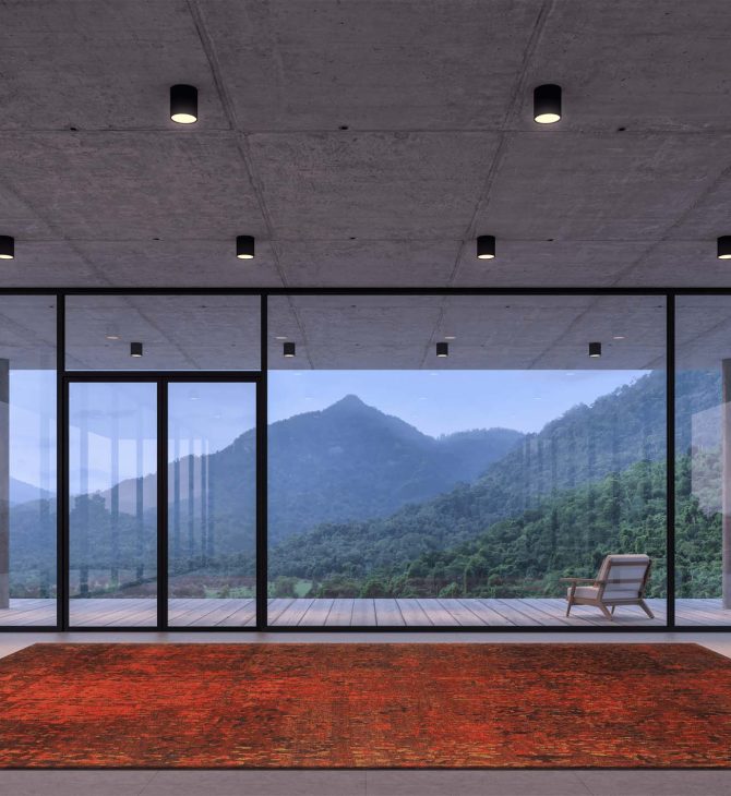 Wohnzimmer mit Glasfront und rotem Teppich Japel - Geba Teppich